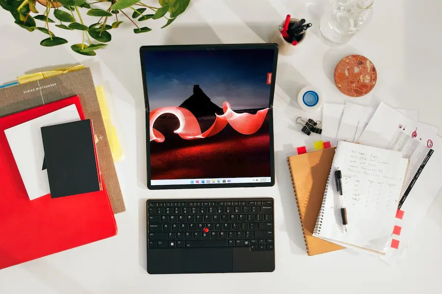 Asus 17 Folding Laptop on desk with wireless keyboard